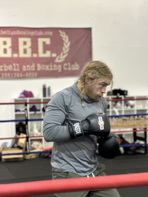 Coach Andrew training in the ring at Ballard Barbell and Boxing Club